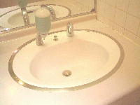 庁舎内洗面所の自動水洗の写真